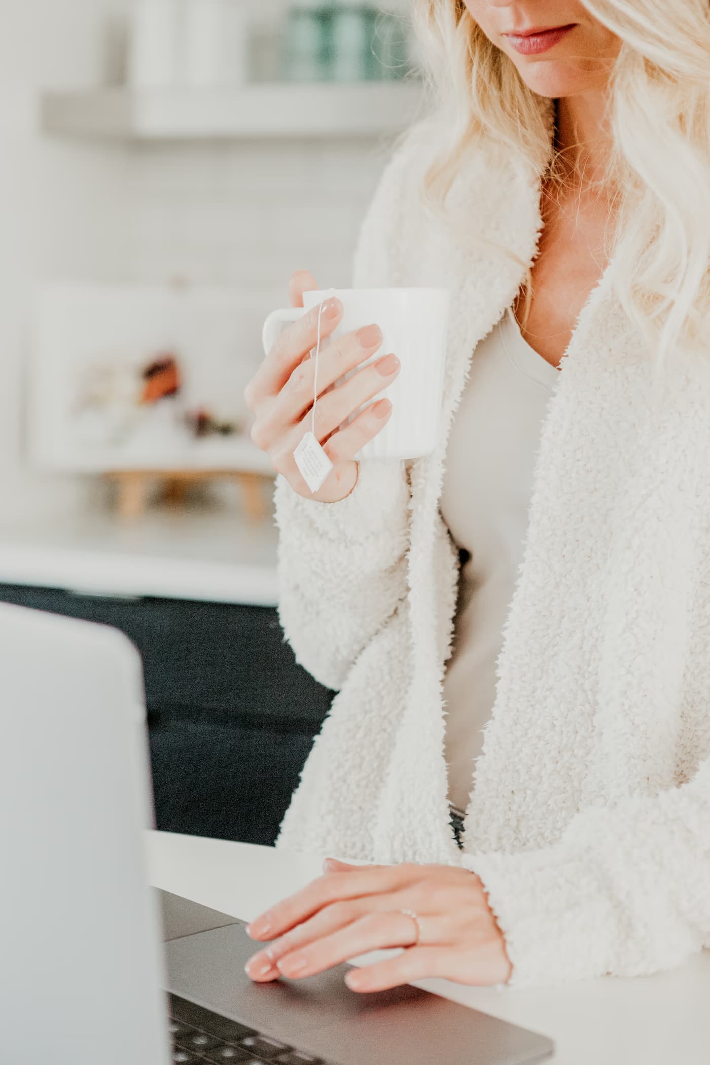 Woman holding a warm mug